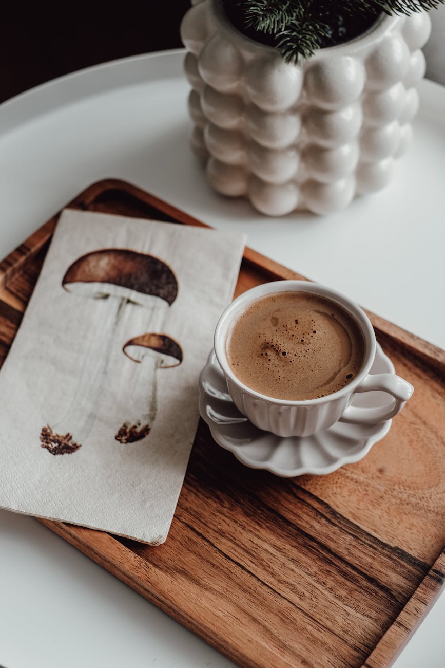 coffee and drawing of mushrooms on tray